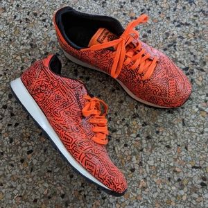 Keith Haring x Reebok abstract neon orange sneakers